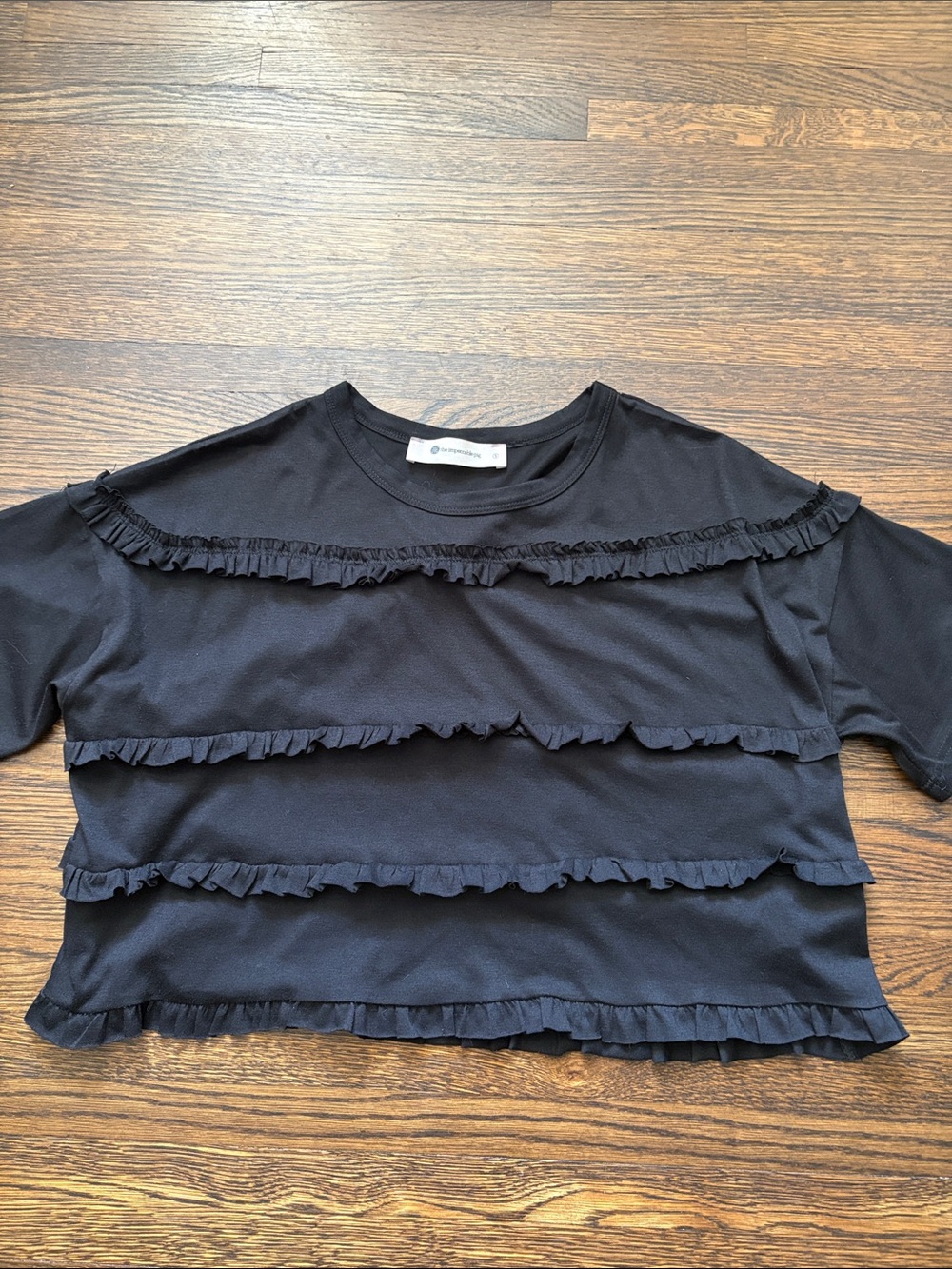 The Impeccable Pig Black Ruffle Tier Short Sleeve Tee